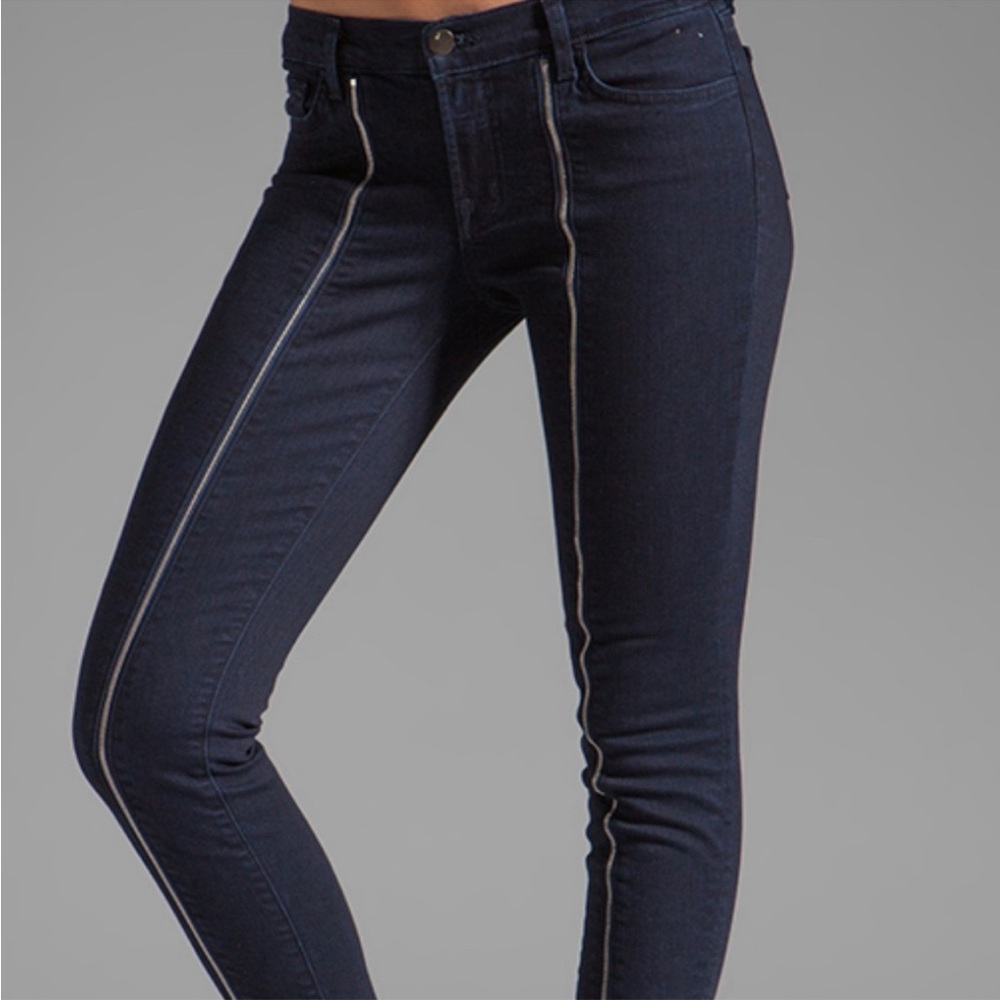 Brand black skinny jeans with leg zipper